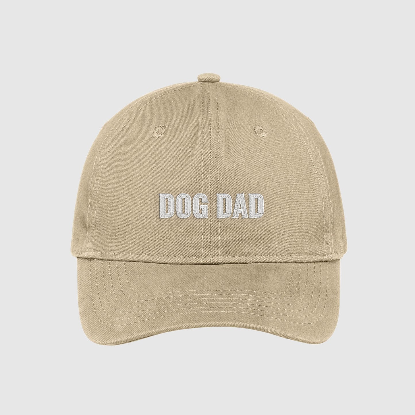 Tan Dog Dad Hat embroidered with white text