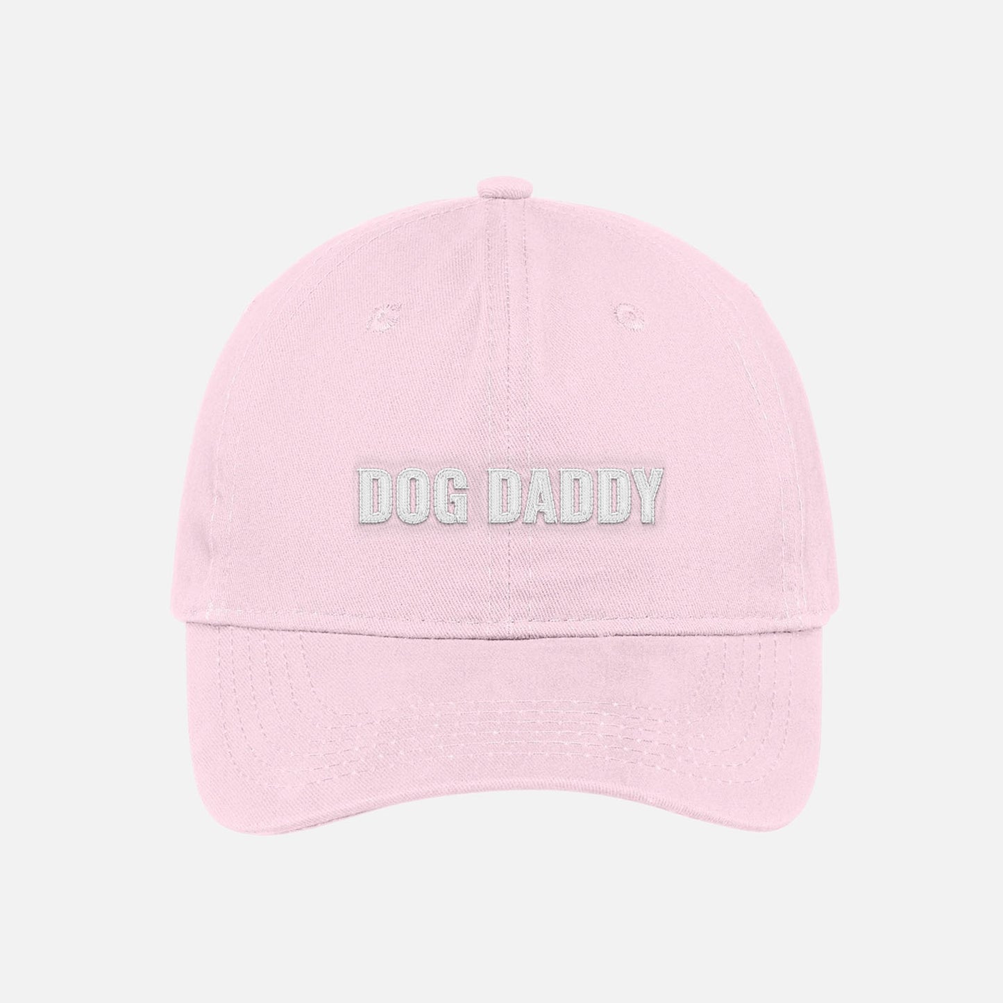 Blush pink pink dog daddy dad hat embroidered baseball cap with white text.