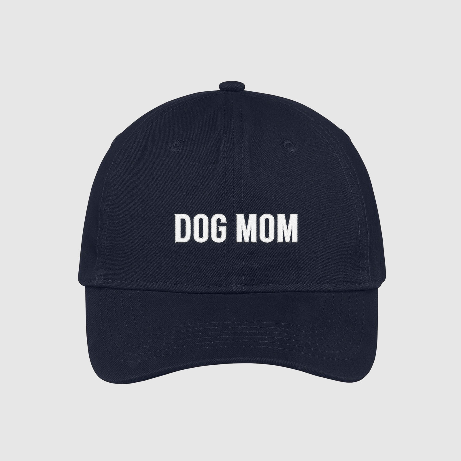 Navy Dog Mom Hat embroidered with white text.