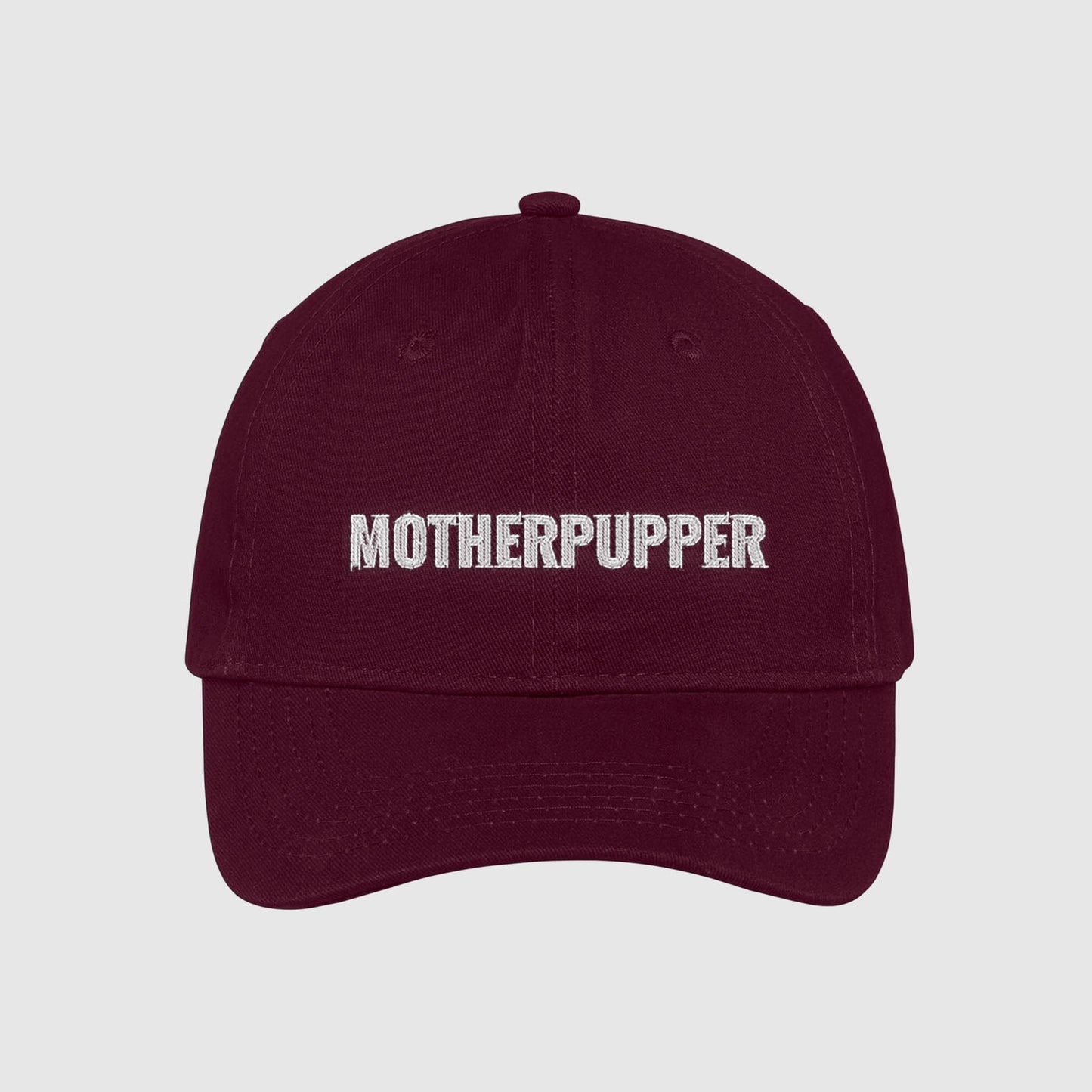 Maroon Mother Pupper dad Hat for dog moms embroidered with white text.